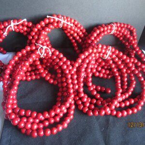 CHRISTMAS RED CRANBERRY WOOD (1/2 IN.) BEAD GARLAND (5) 9FT. EACH